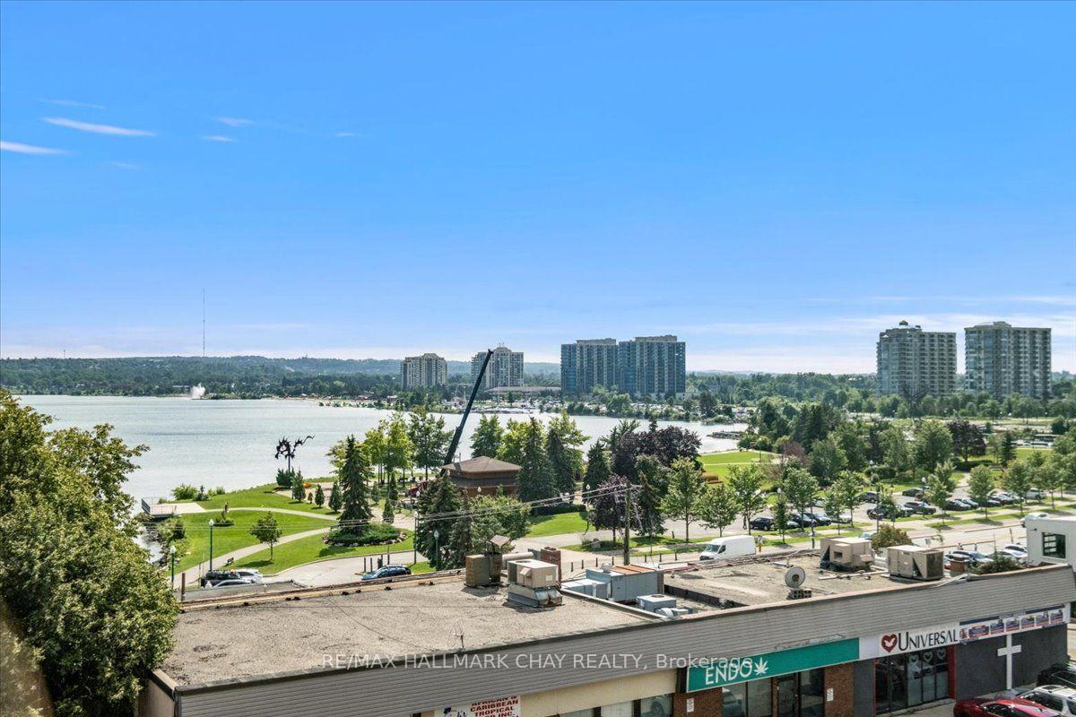 Photo 11 of Unit 407, 140 Dunlop Street E, Barrie, Lakeshore — HOMEH