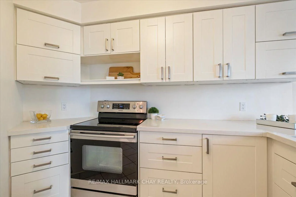 Photo 25 of Unit 407, 140 Dunlop Street E, Barrie, Lakeshore — HOMEH