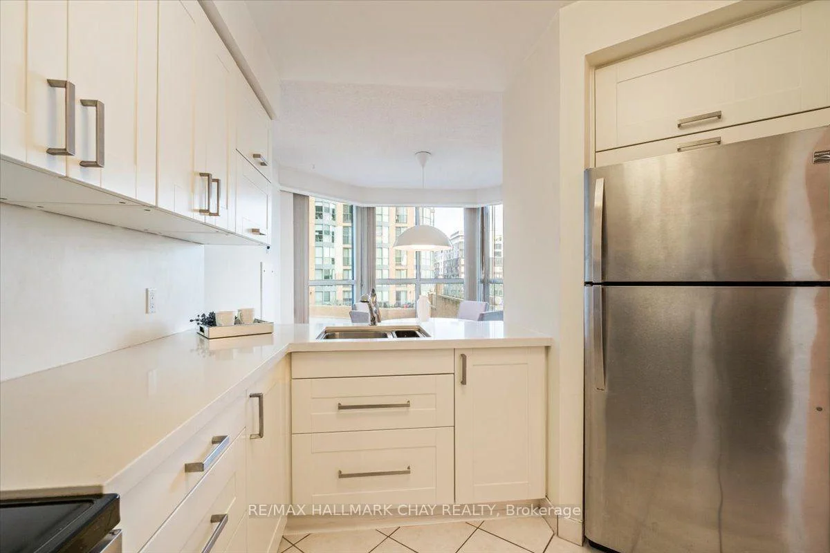 Photo 27 of Unit 407, 140 Dunlop Street E, Barrie, Lakeshore — HOMEH