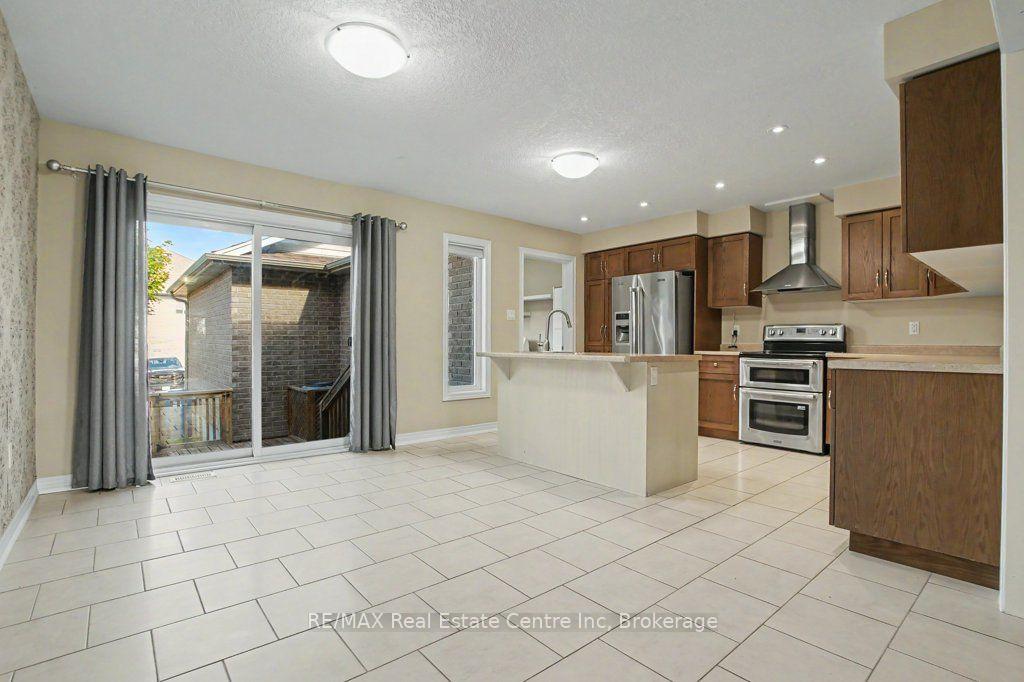 Photo 11 of Unit 14, 14 Amos Drive, Guelph, Kortright East — HOMEH