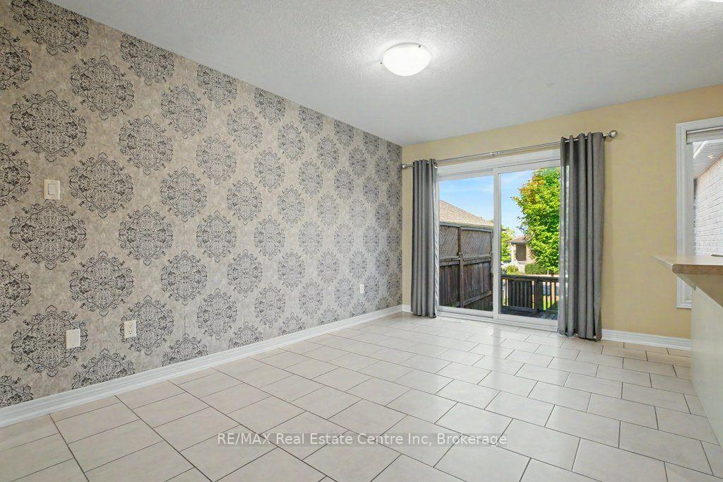 Photo 13 of Unit 14, 14 Amos Drive, Guelph, Kortright East — HOMEH