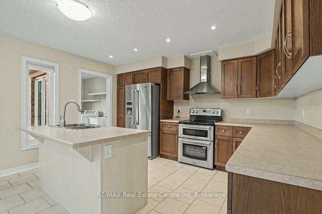 Photo 14 of Unit 14, 14 Amos Drive, Guelph, Kortright East — HOMEH