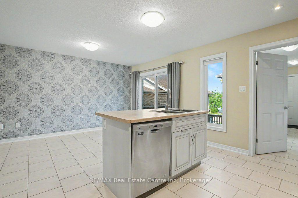 Photo 16 of Unit 14, 14 Amos Drive, Guelph, Kortright East — HOMEH