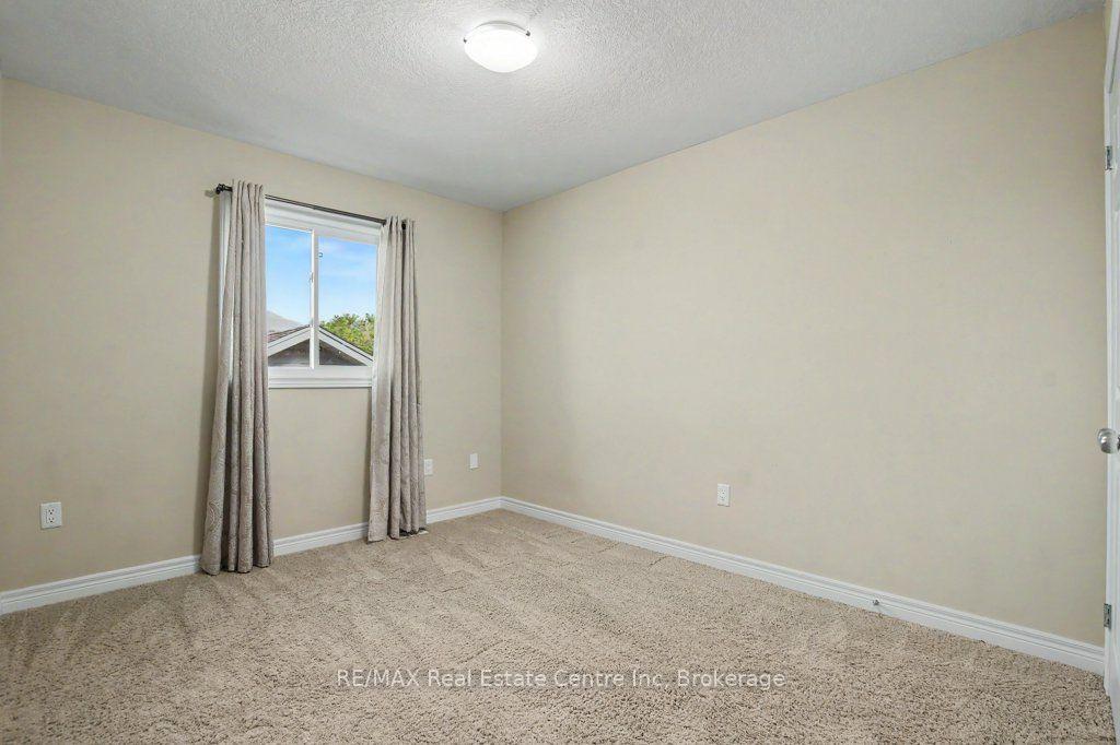 Photo 23 of Unit 14, 14 Amos Drive, Guelph, Kortright East — HOMEH