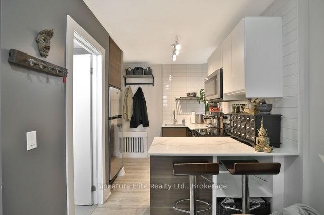 Photo 3 of Unit 303, 112 Alder Crescent, Etobicoke, Long Branch — HOMEH