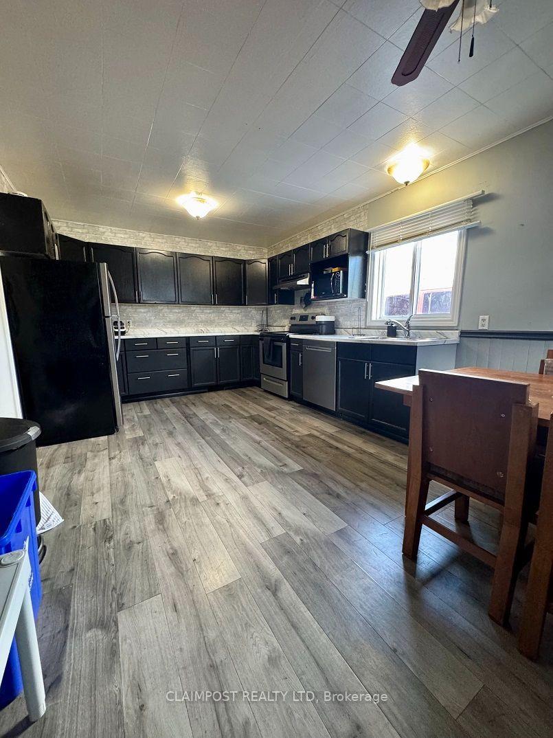Photo 3 of 118 Columbus Avenue, Timmins, TS - SW — HOMEH