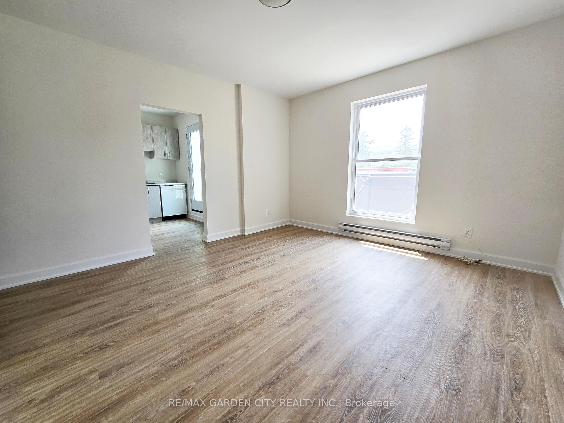 Photo 2 of Unit 2, 63 Main Street E, Grimsby, Grimsby East — HOMEH
