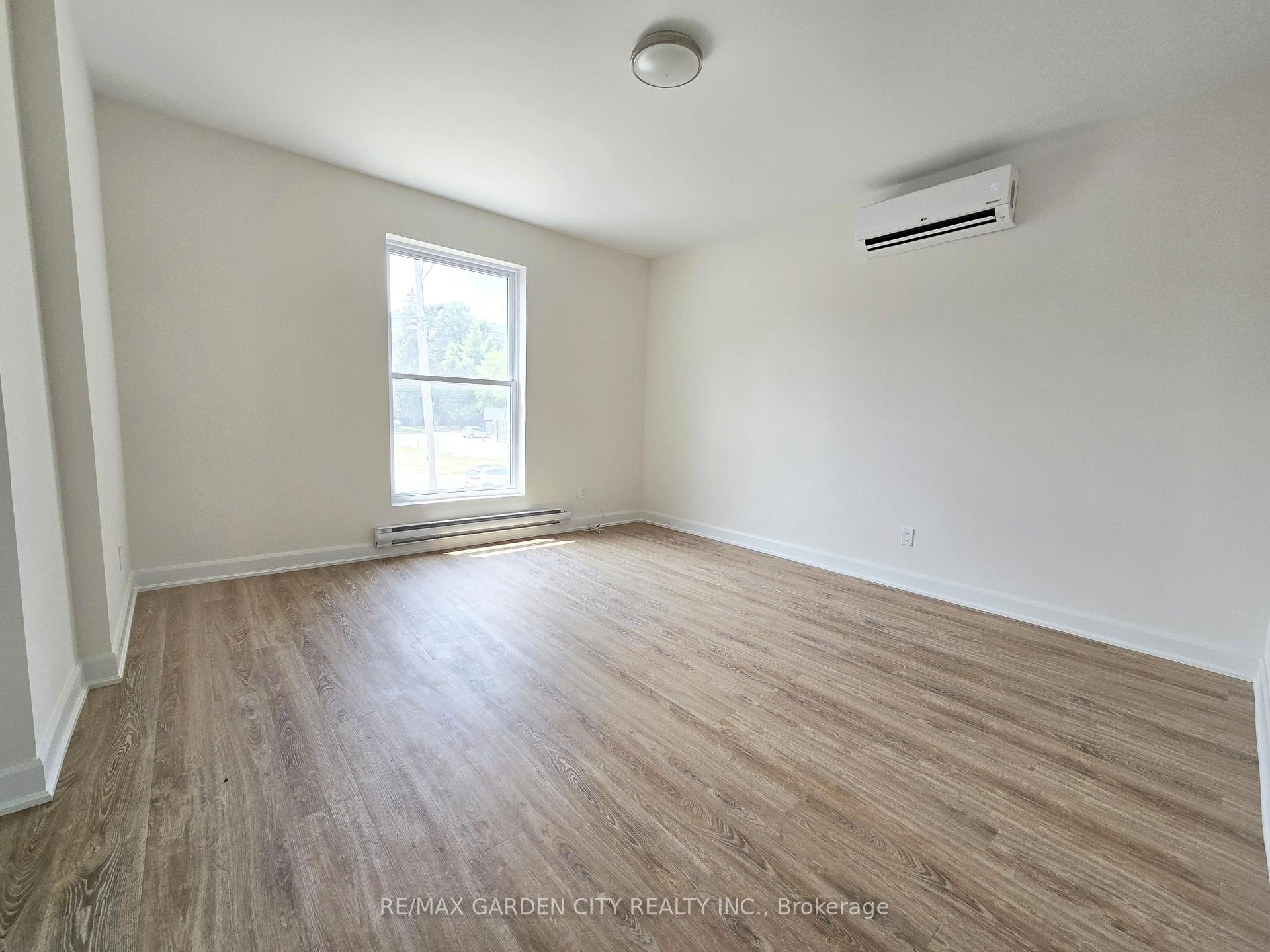 Photo 3 of Unit 2, 63 Main Street E, Grimsby, Grimsby East — HOMEH
