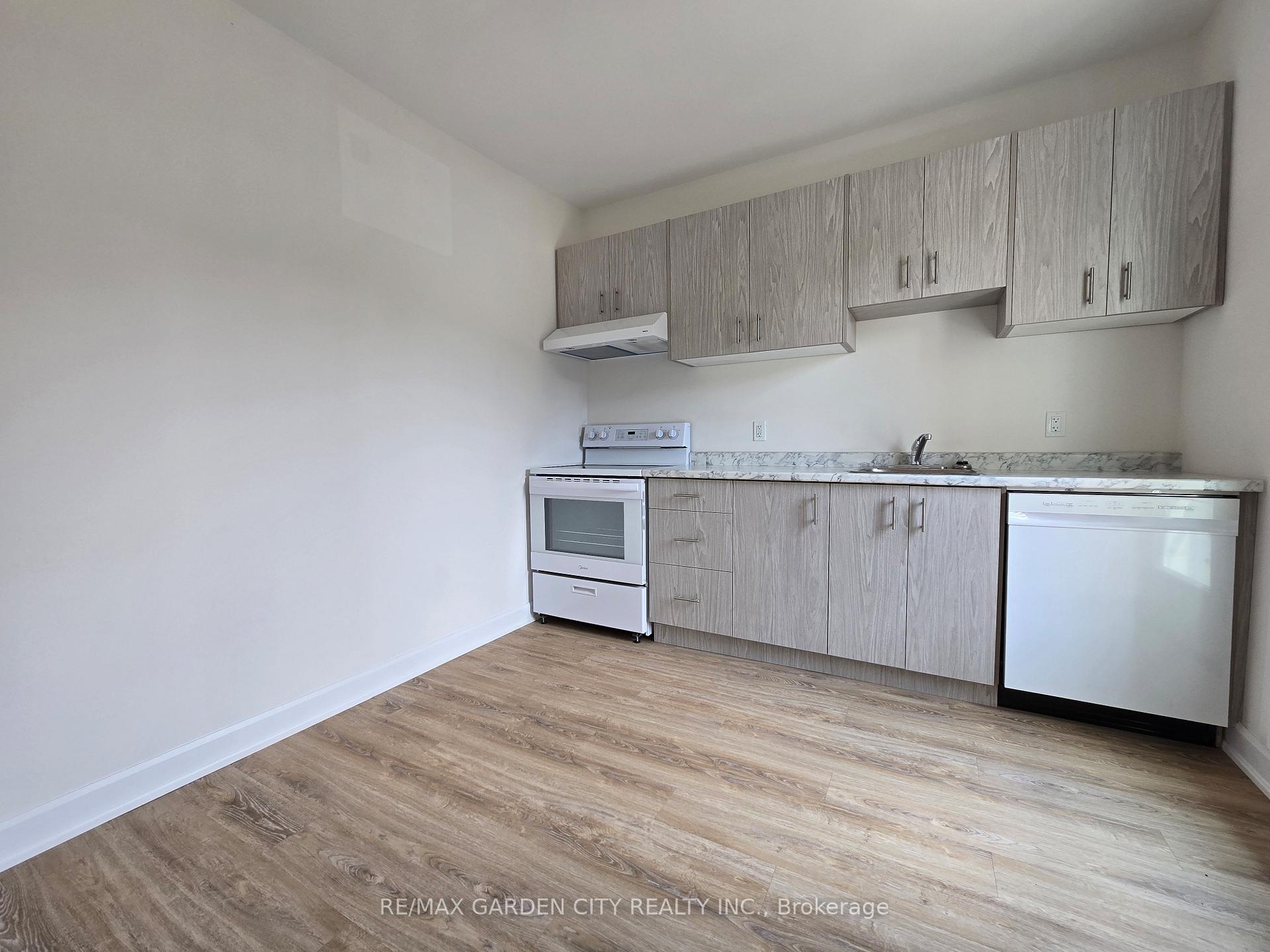 Photo 6 of Unit 2, 63 Main Street E, Grimsby, Grimsby East — HOMEH