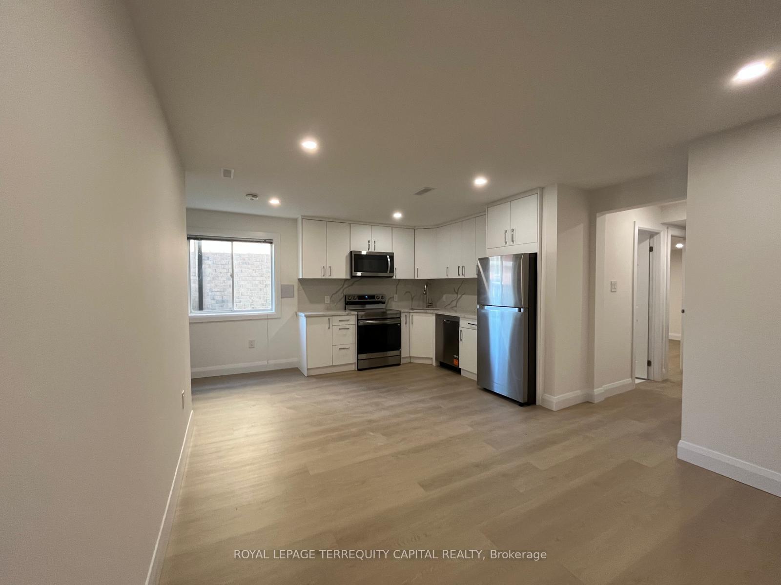 Photo 2 of Unit 1, 63 River Ridge Road, Barrie, Bayshore — HOMEH