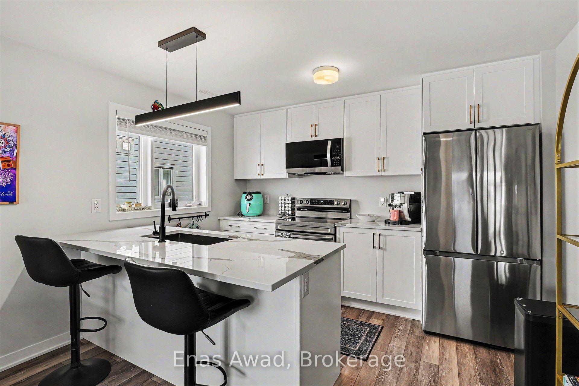 Photo 5 of Unit 1, 802 Lillian Freiman Private, Ottawa, Barrhaven - Half Moon Bay — HOMEH