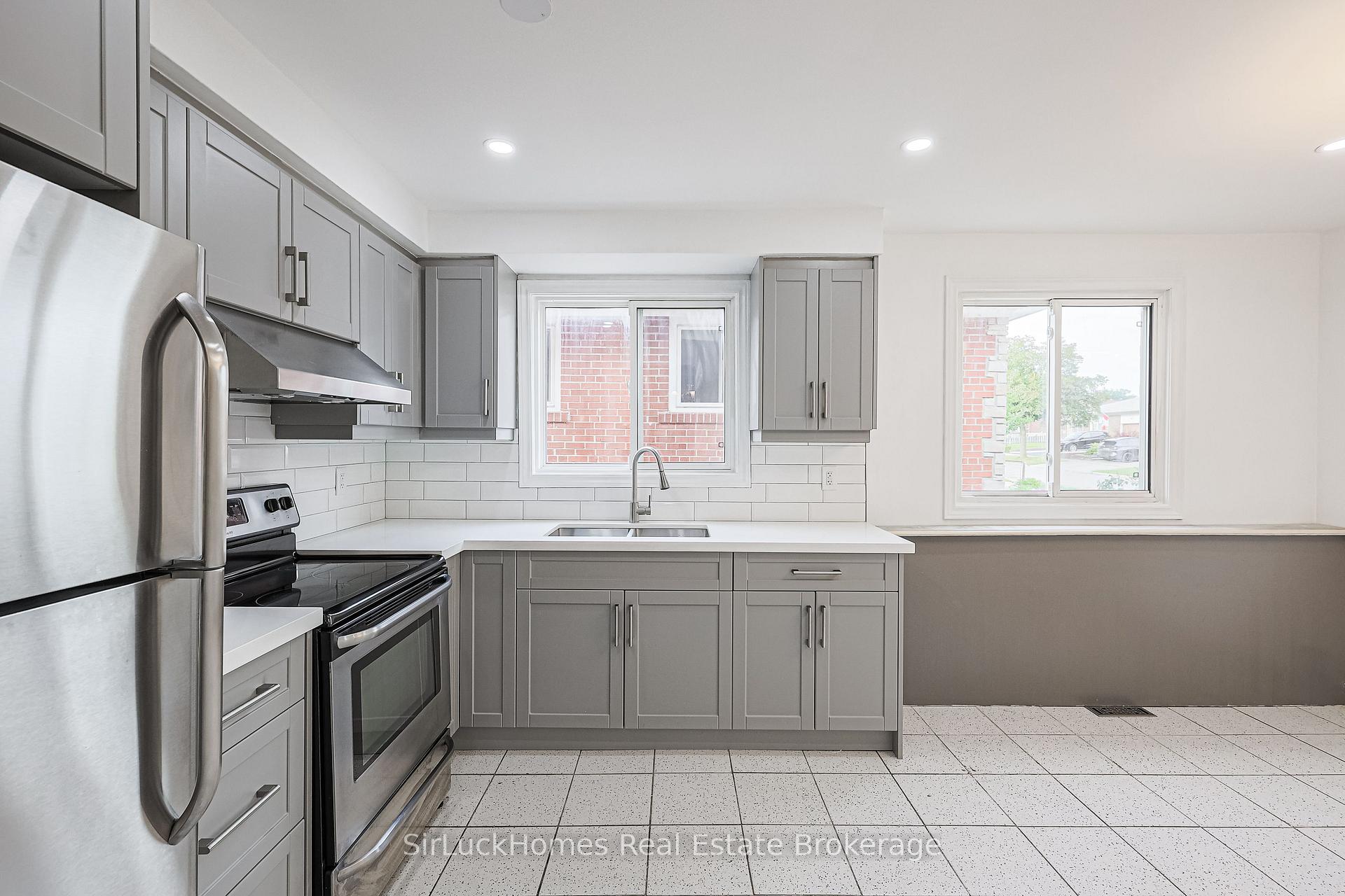 Photo 12 of 52 Dellbrook Crescent, North York, Humber Summit — HOMEH
