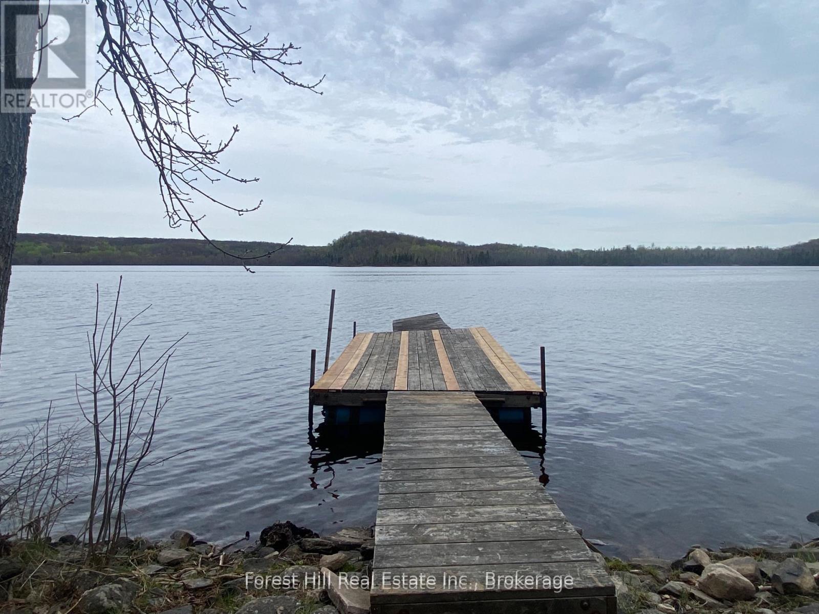 Photo 4 of 919 Limberlost Point Road, Parry Sound Remote Area, Restoule — HOMEH