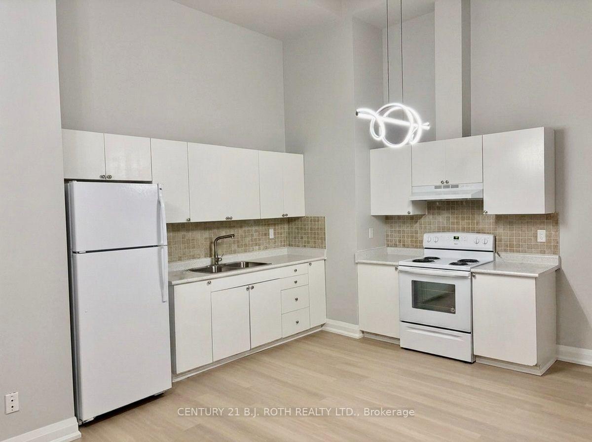 Photo 5 of Unit 105, 19 Dunlop Street W, Barrie, City Centre — HOMEH