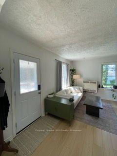 Photo 2 of Unit 1, 16 Queen Street N, Minto — HOMEH