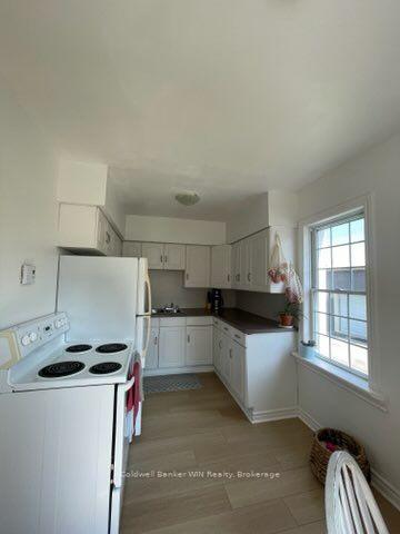 Photo 5 of Unit 1, 16 Queen Street N, Minto — HOMEH