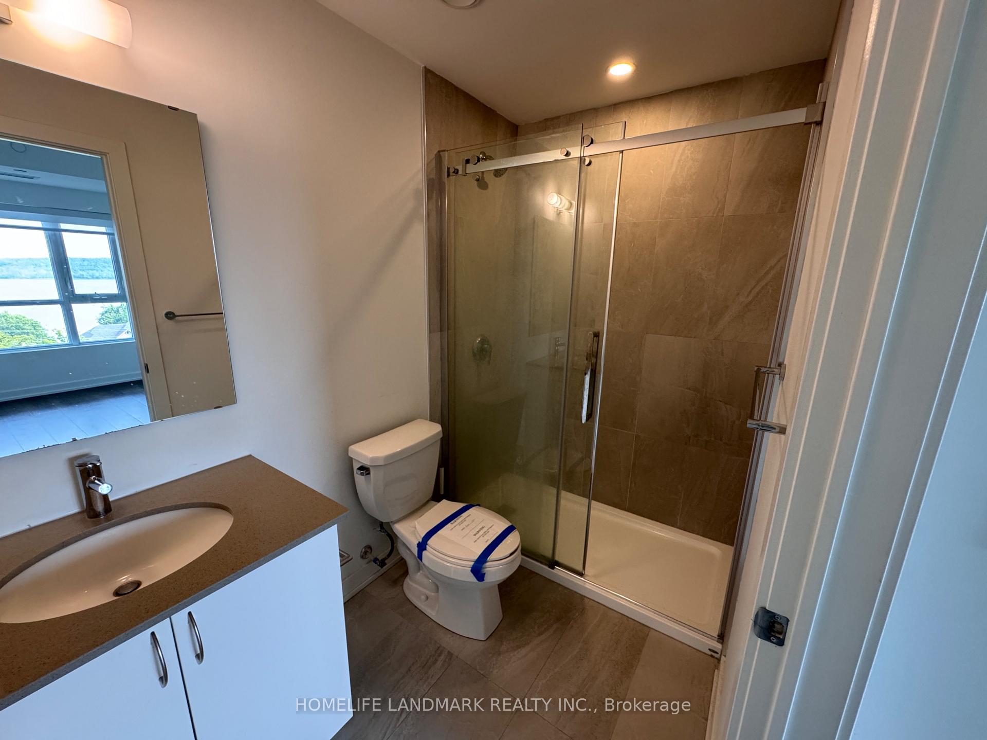 Photo 11 of Unit 409, 56 Lakeside Terrace, Barrie, Little Lake — HOMEH