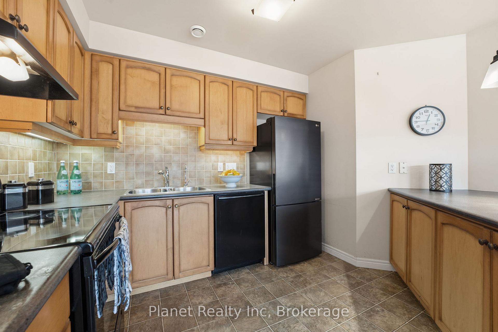 Photo 10 of Unit 301, 65 Bayberry Drive, Guelph, Village By The Arboretum — HOMEH