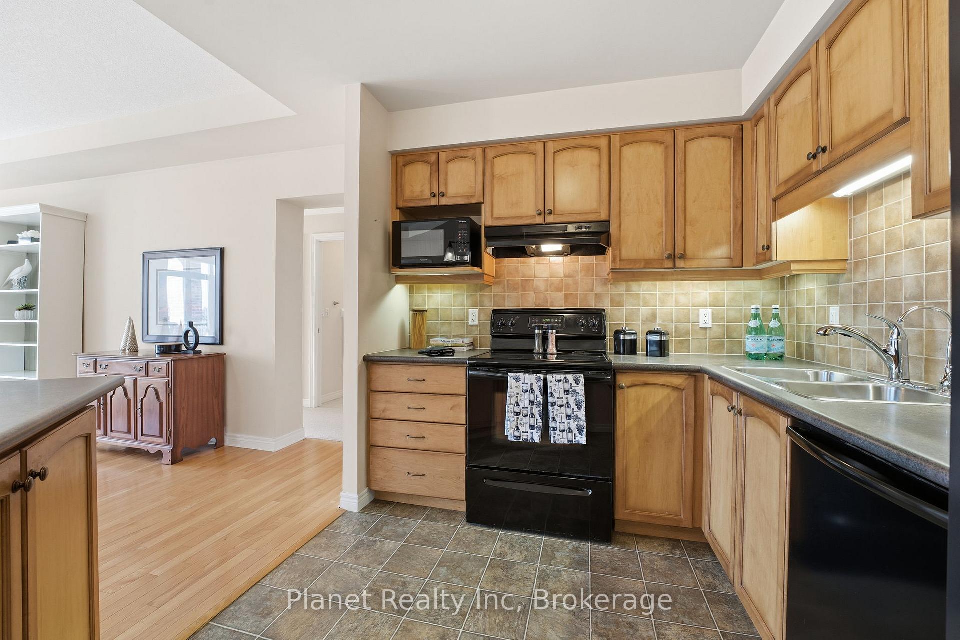 Photo 11 of Unit 301, 65 Bayberry Drive, Guelph, Village By The Arboretum — HOMEH