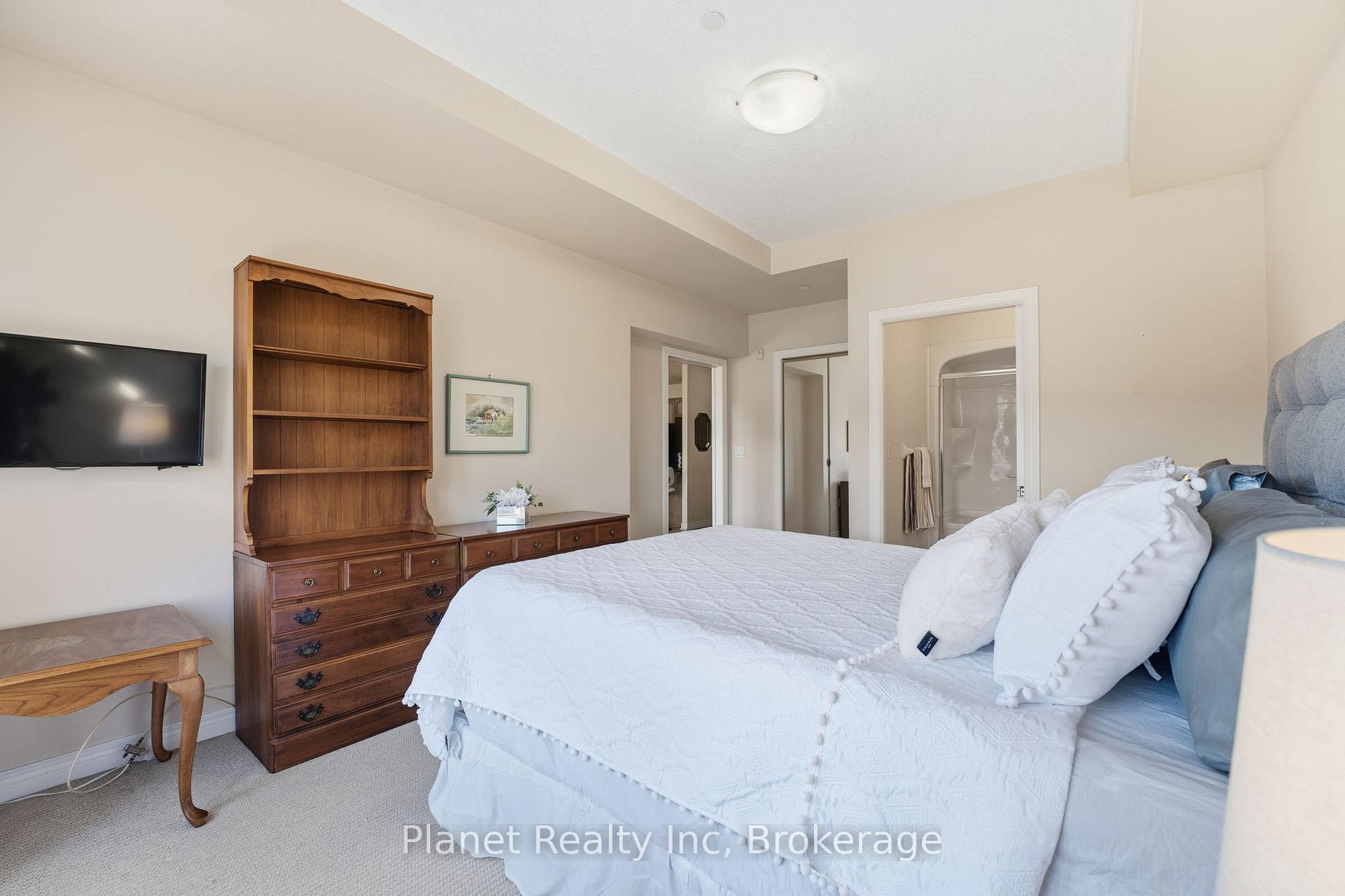 Photo 15 of Unit 301, 65 Bayberry Drive, Guelph, Village By The Arboretum — HOMEH