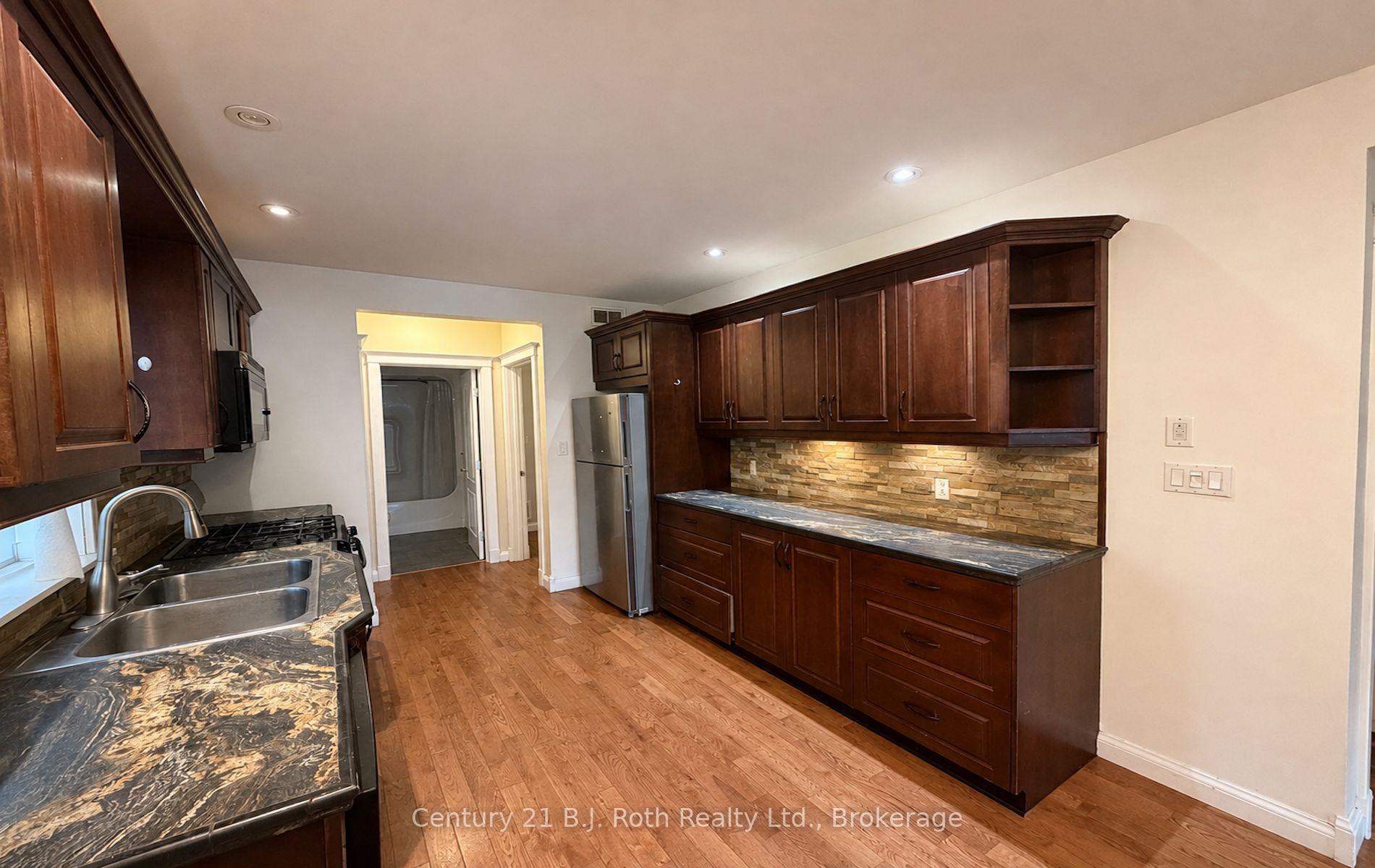 Photo 3 of 100 Cameron Street, Orillia — HOMEH