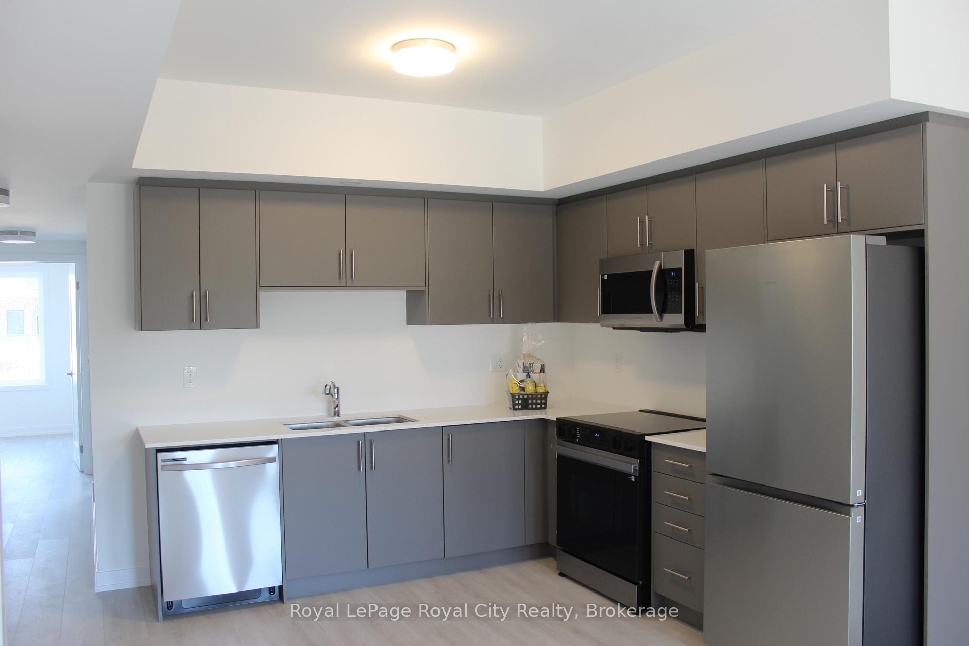 Photo 4 of Unit 64, 42 Lowes Road W, Guelph, Clairfields/Hanlon Business Park — HOMEH