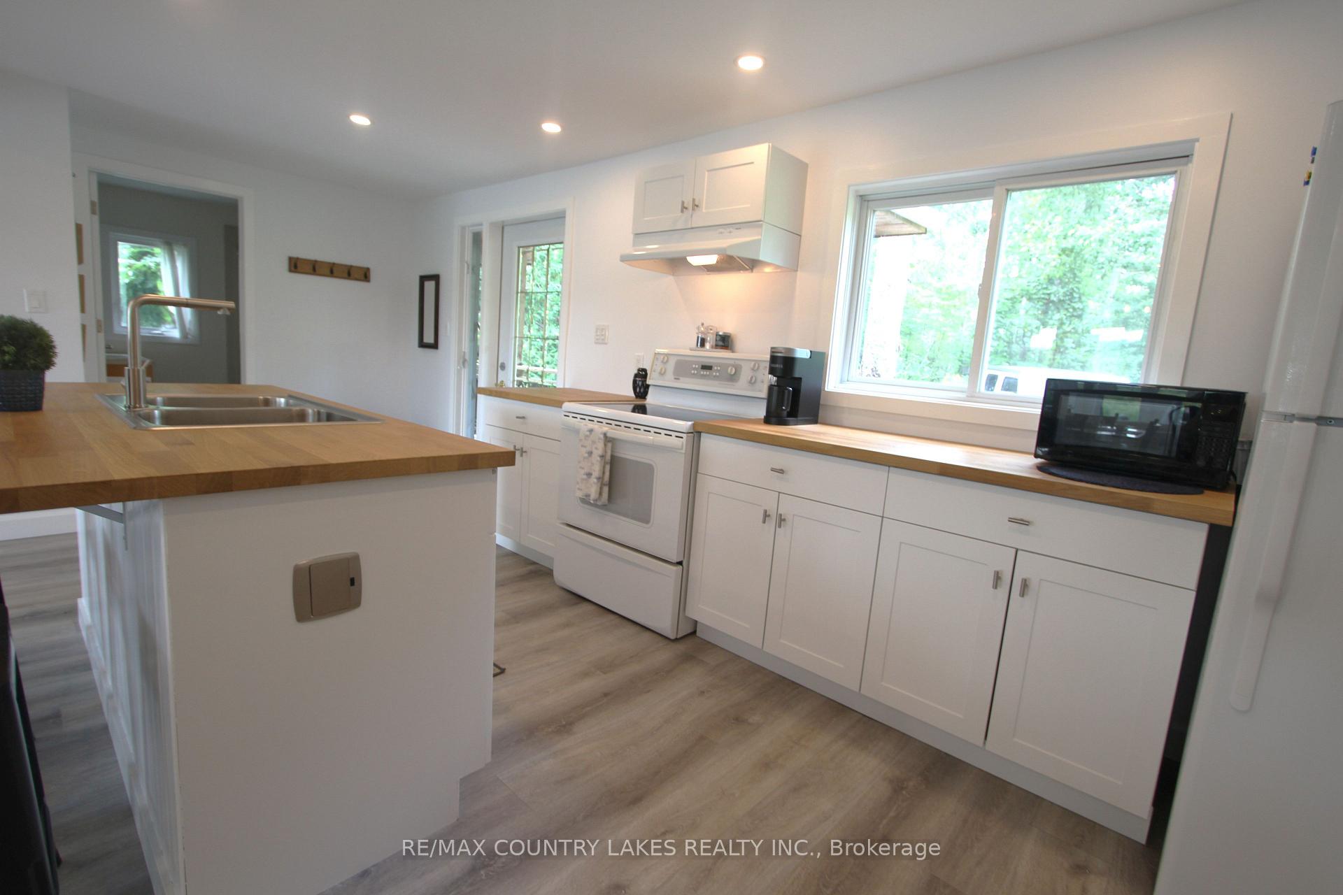 Photo 10 of 129 McGuire Beach Road, Kawartha Lakes, Carden — HOMEH