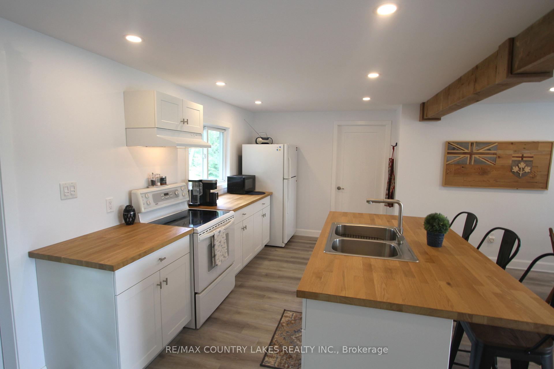Photo 11 of 129 McGuire Beach Road, Kawartha Lakes, Carden — HOMEH