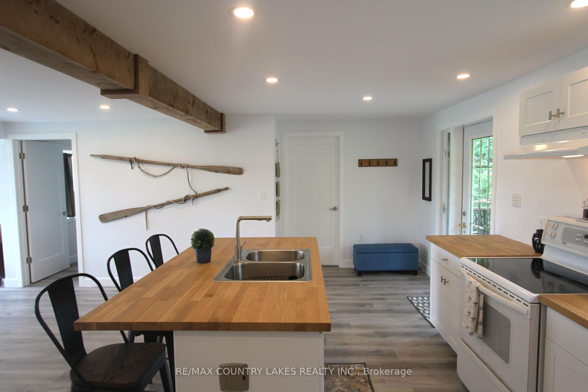Photo 13 of 129 McGuire Beach Road, Kawartha Lakes, Carden — HOMEH
