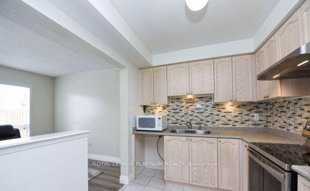 Photo 9 of 80 Lake Louise Drive, Brampton, Fletcher's Meadow — HOMEH