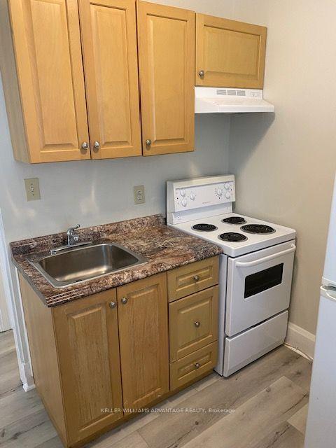 Photo 8 of 110-112 Dewhurst Boulevard, Toronto, Danforth — HOMEH