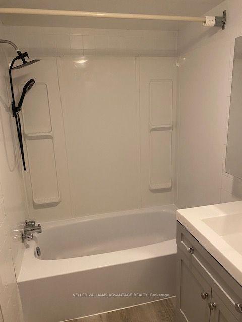 Photo 10 of 110-112 Dewhurst Boulevard, Toronto, Danforth — HOMEH