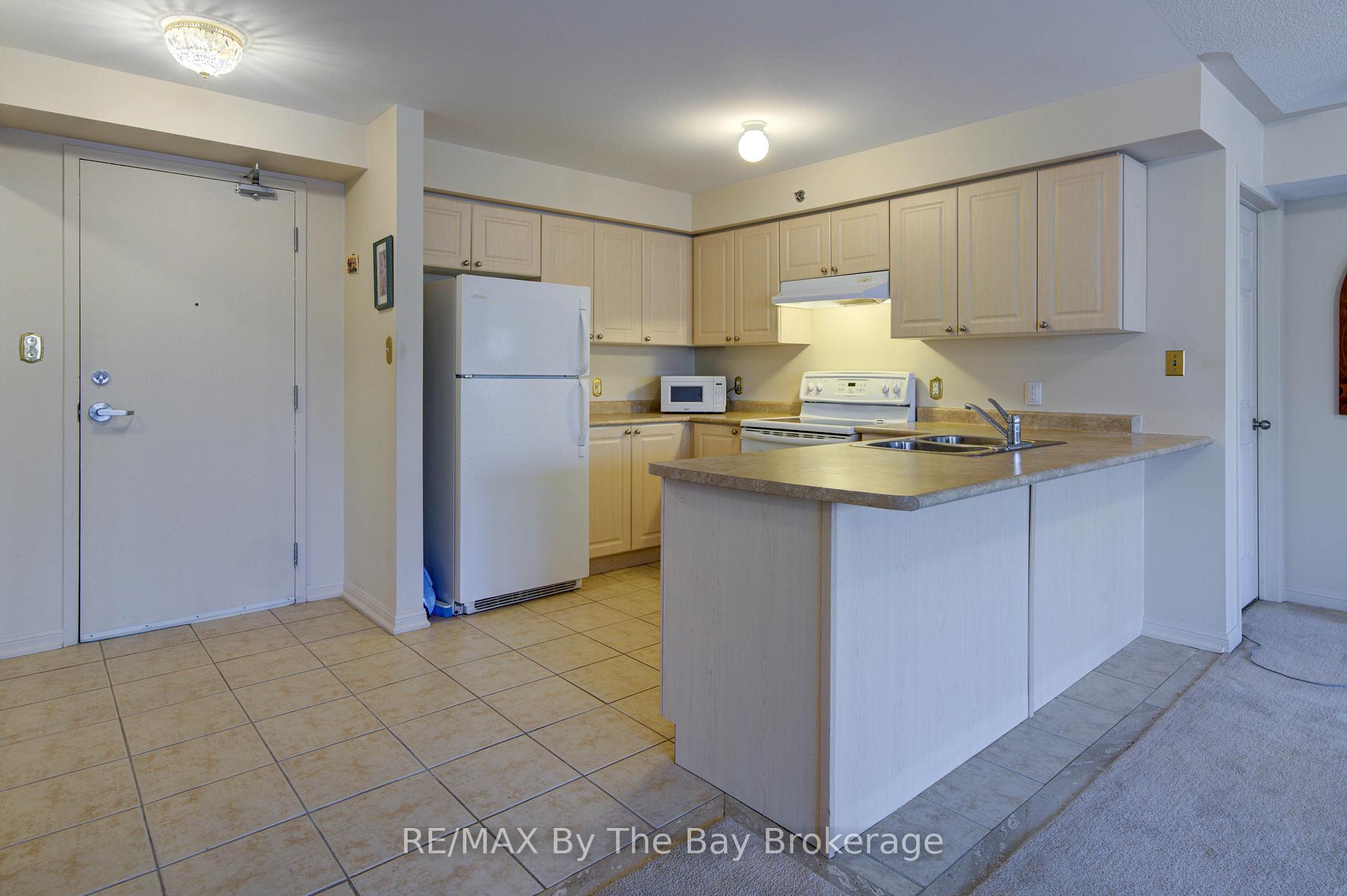 Photo 12 of Unit 202, 16 Westbury Road, Wasaga Beach — HOMEH