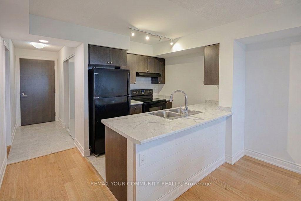 Photo 3 of Unit 909, 1346 Danforth Road E, Scarborough, Eglinton East — HOMEH