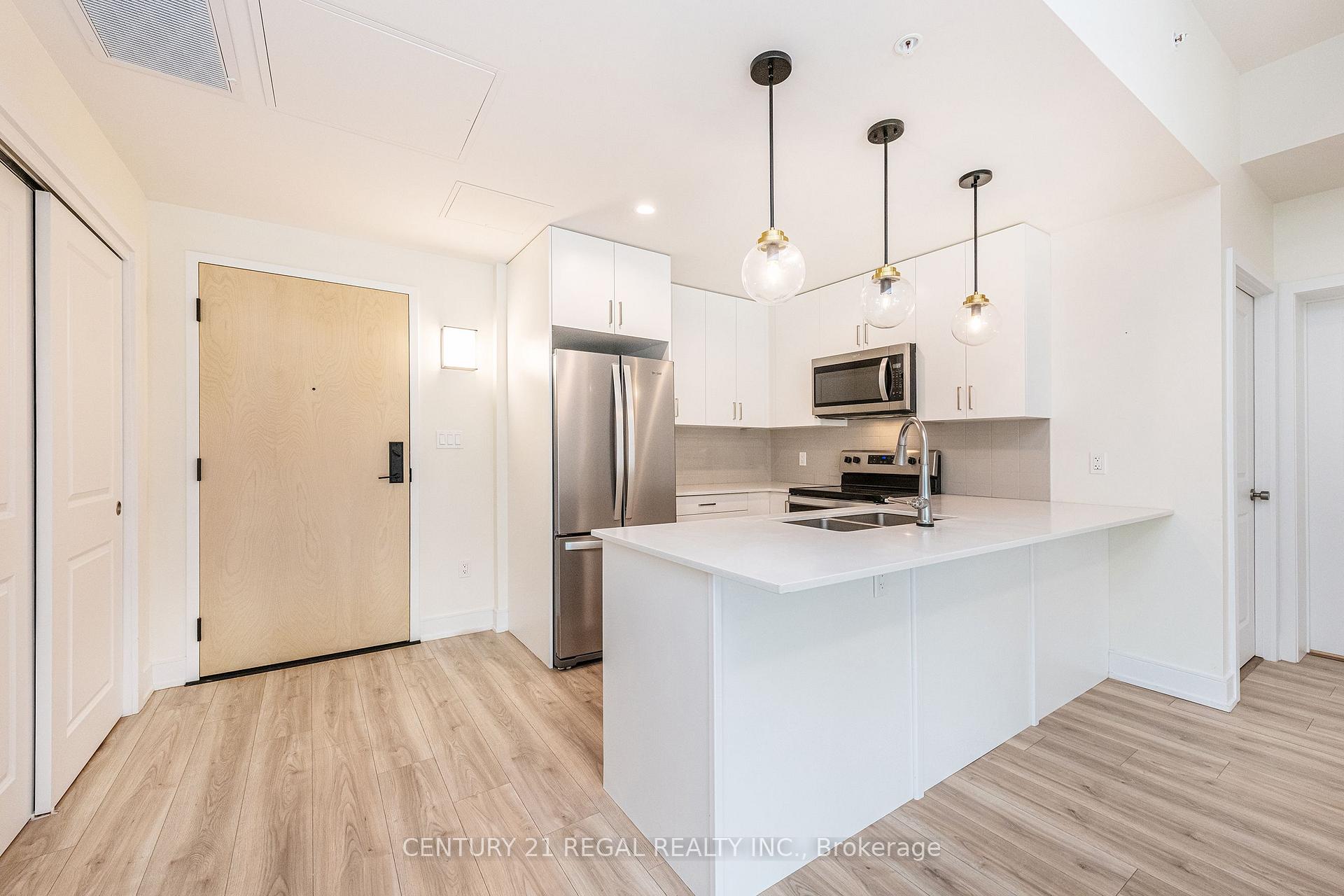 Photo 2 of Unit Unit 205, 121 Mary Street, Clearview, Creemore — HOMEH