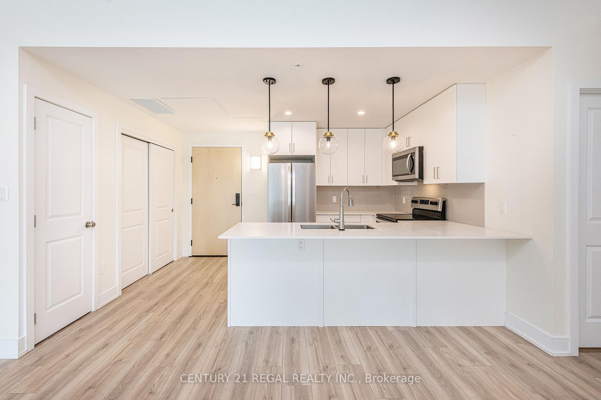 Photo 3 of Unit Unit 205, 121 Mary Street, Clearview, Creemore — HOMEH