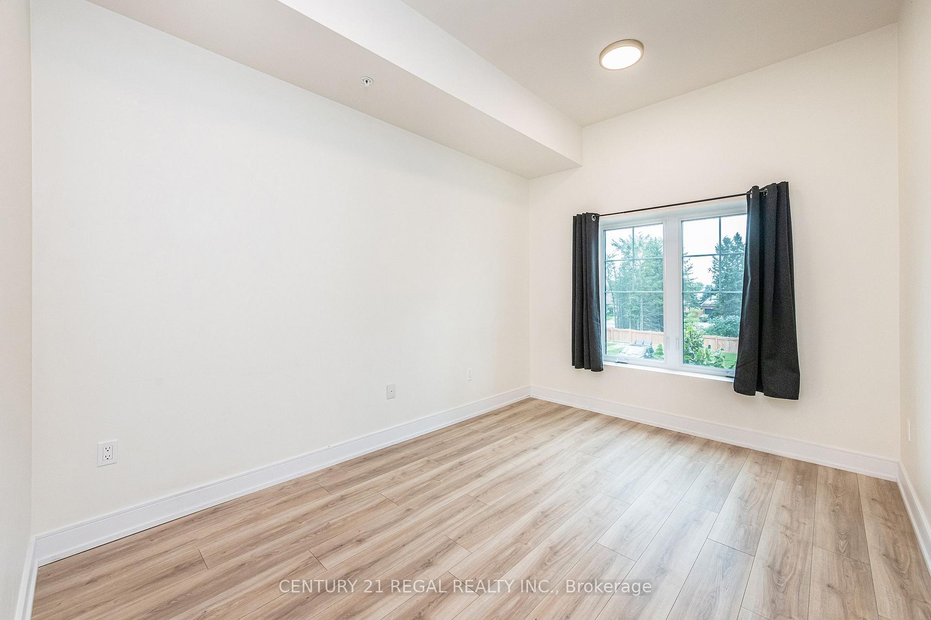 Photo 21 of Unit Unit 205, 121 Mary Street, Clearview, Creemore — HOMEH