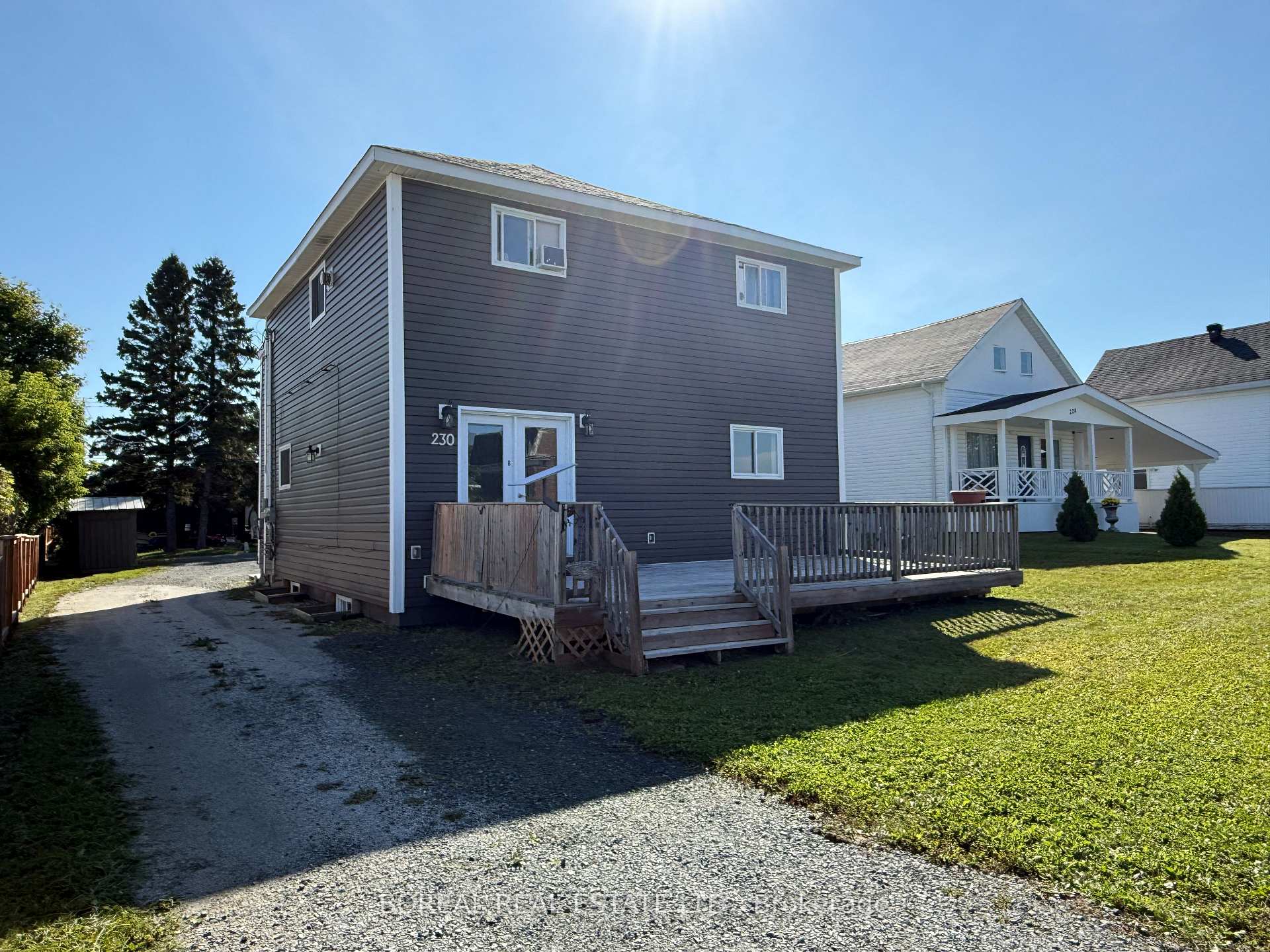 Photo 2 of 230 Tenth Avenue, Cochrane — HOMEH