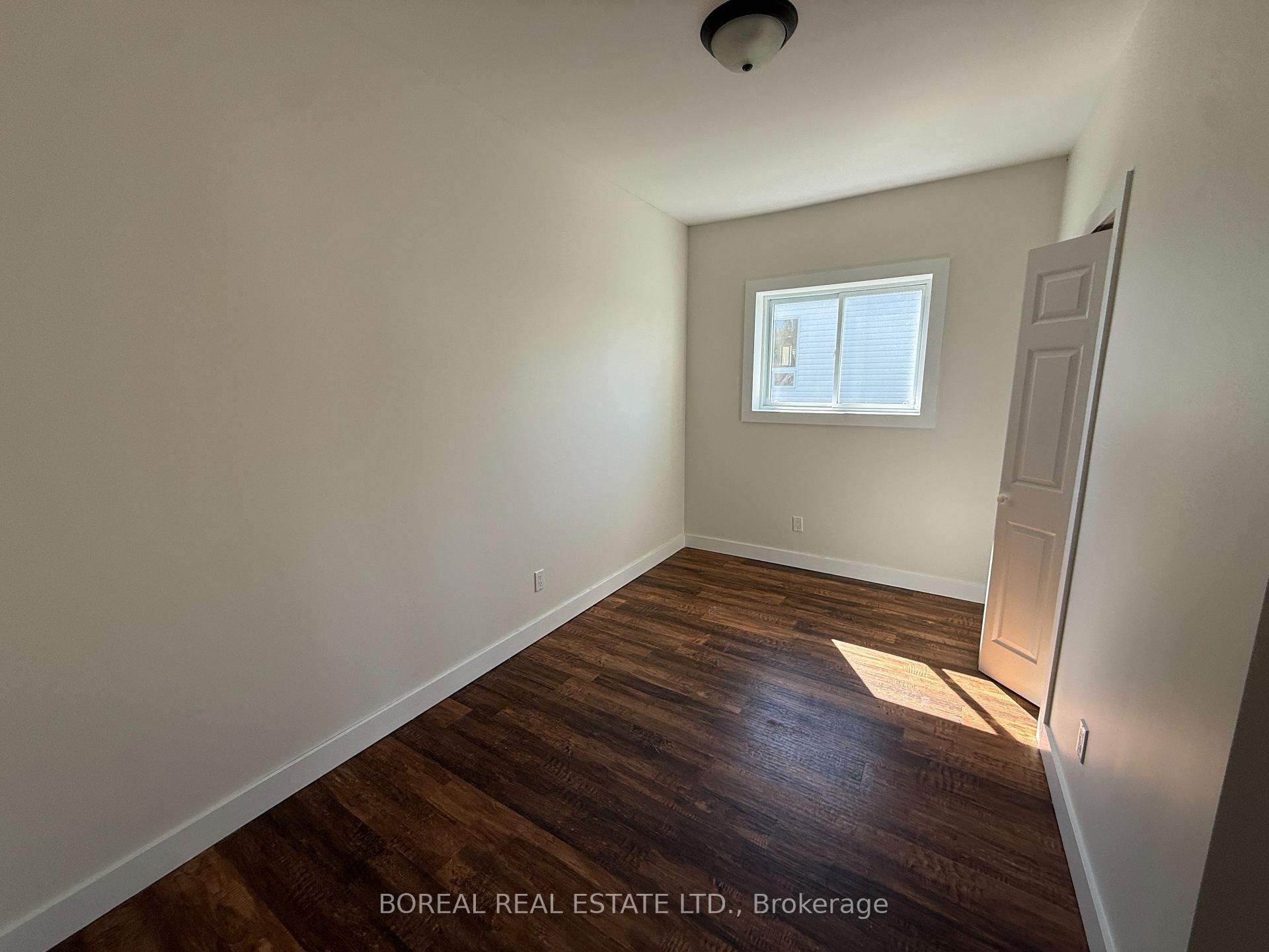 Photo 14 of 230 Tenth Avenue, Cochrane — HOMEH