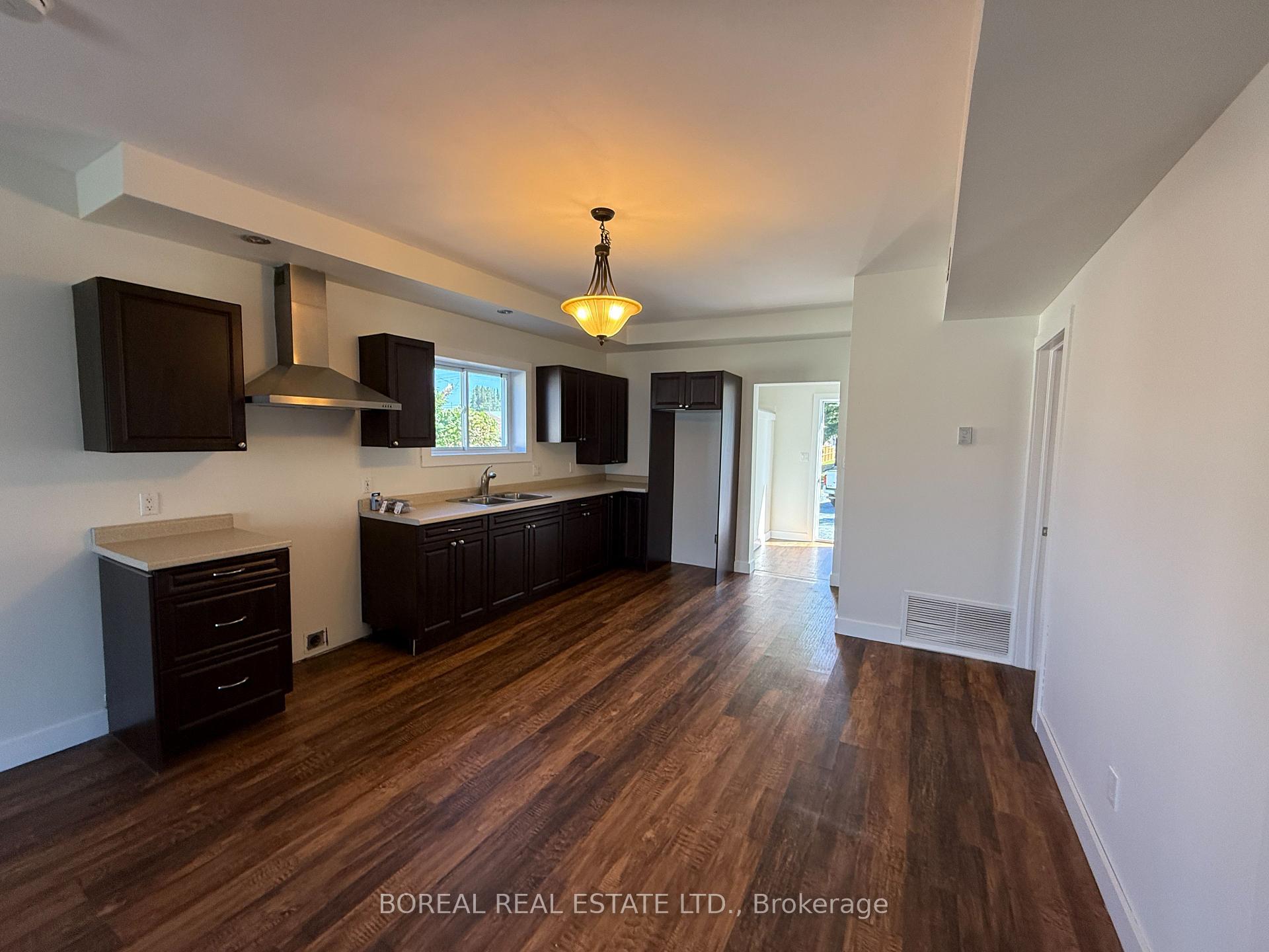 Photo 18 of 230 Tenth Avenue, Cochrane — HOMEH