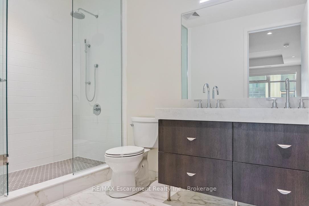 Photo 7 of Unit 216, 123 Maurice Drive, Oakville, Central — HOMEH