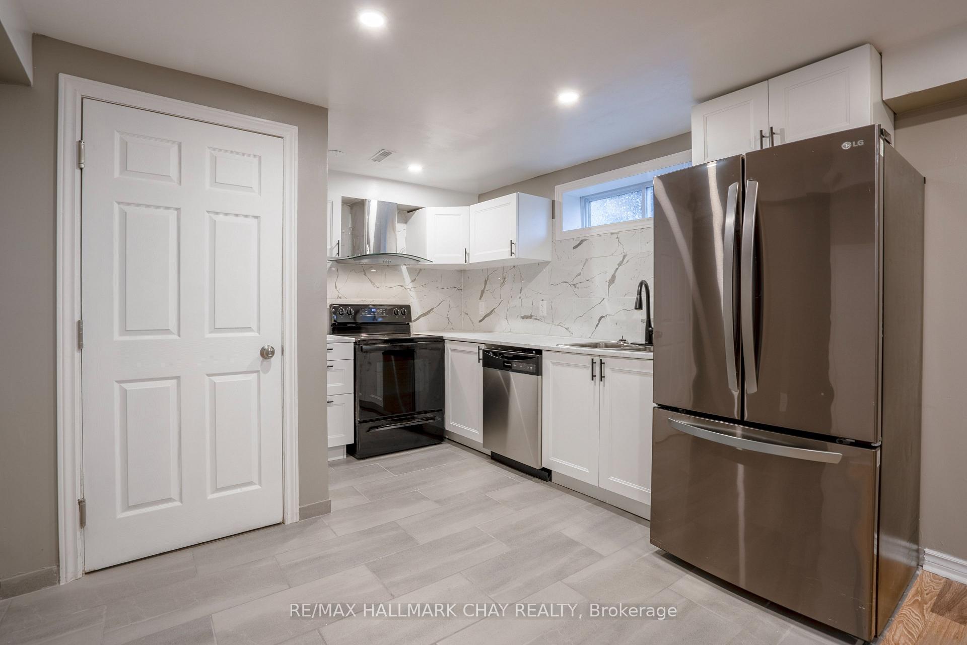 Photo 2 of Unit Basement, 61 Neelands Street, Barrie, West Bayfield — HOMEH