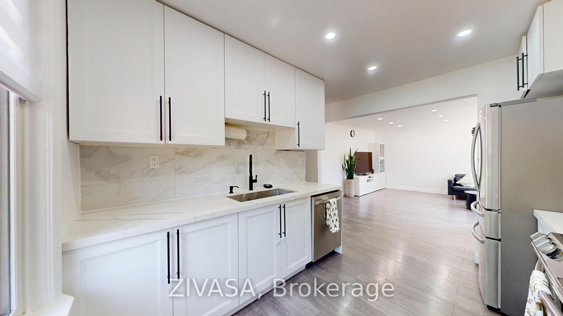 Photo 7 of 125 Jeffcoat Drive, Etobicoke, West Humber-Clairville — HOMEH