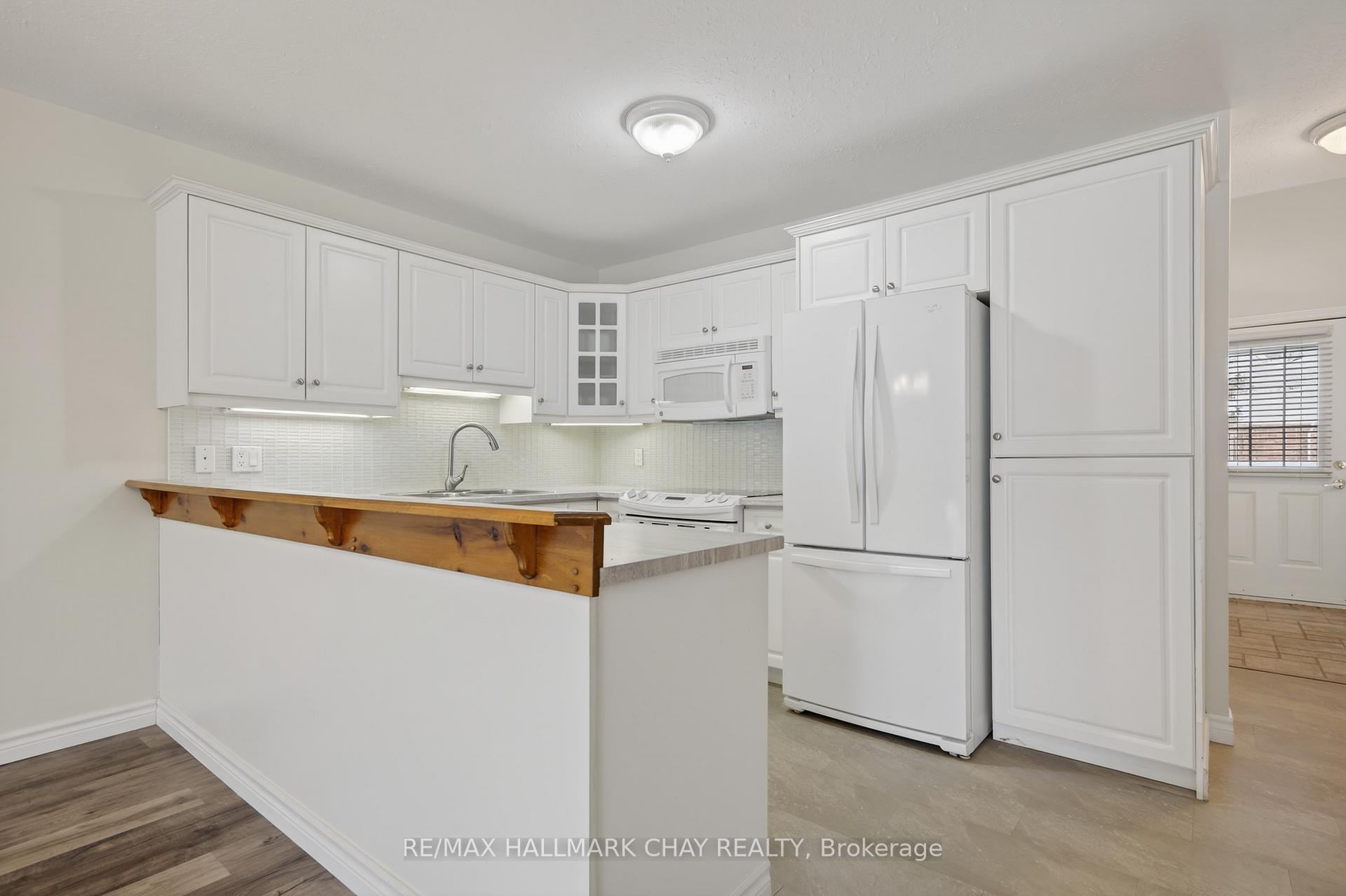 Photo 10 of Unit 11, 275 Huron Street, Clearview, Stayner — HOMEH