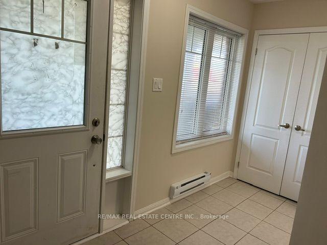 Photo 2 of Unit 4, 6020 Derry Road, Milton, Harrison — HOMEH