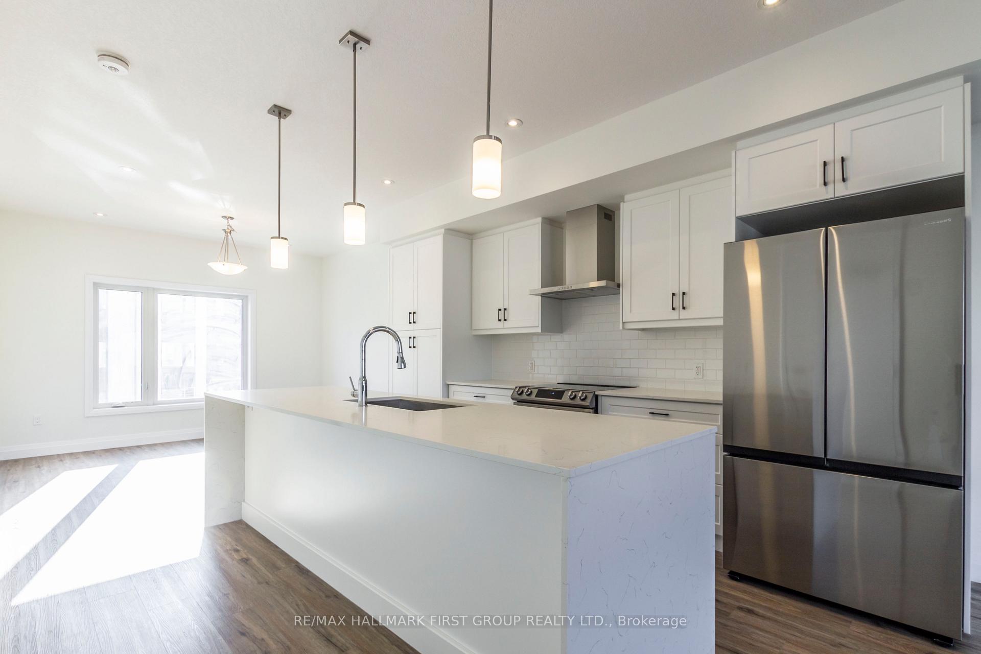 Photo 5 of 12 Lily Lane, Guelph, Clairfields/Hanlon Business Park — HOMEH