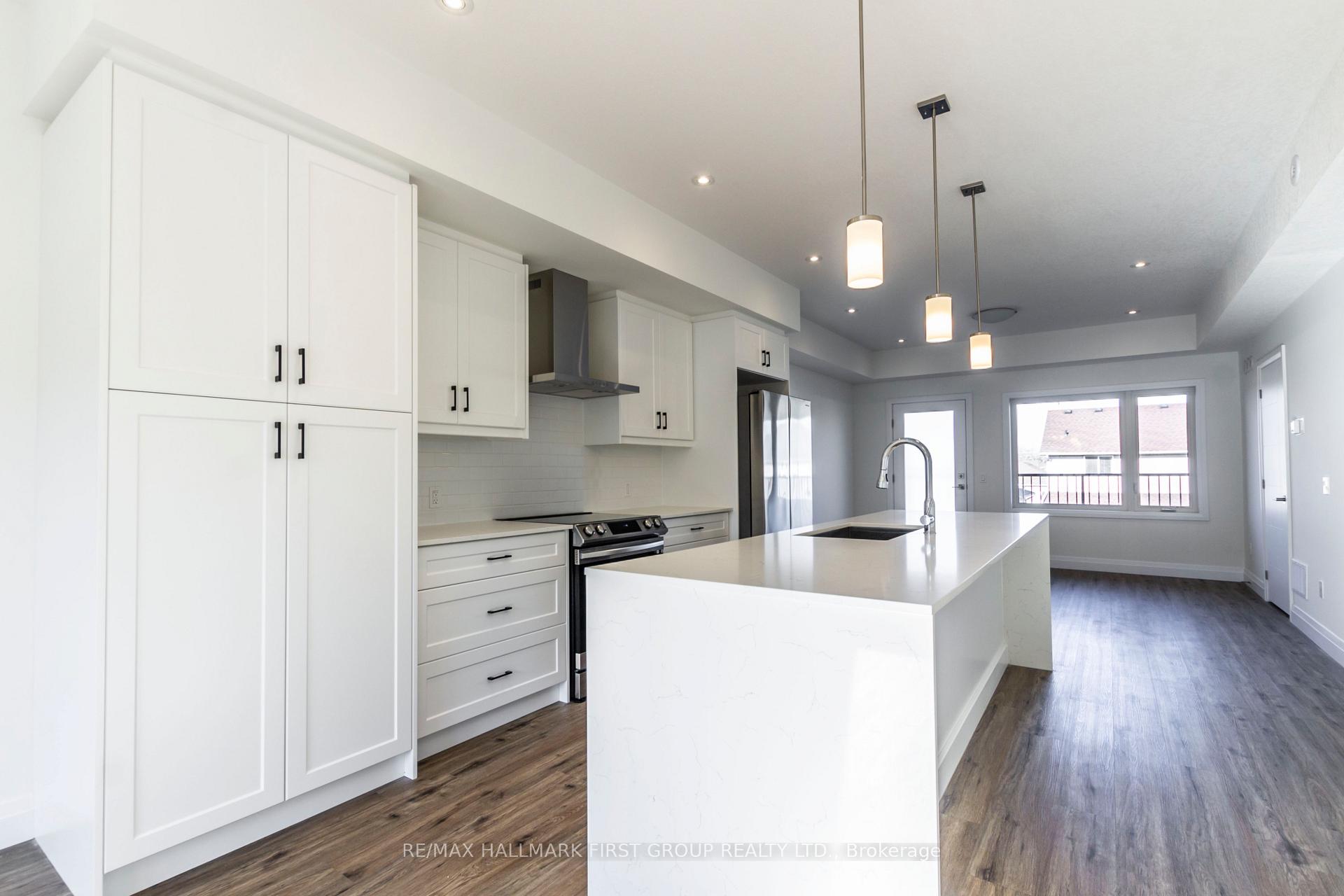 Photo 6 of 12 Lily Lane, Guelph, Clairfields/Hanlon Business Park — HOMEH