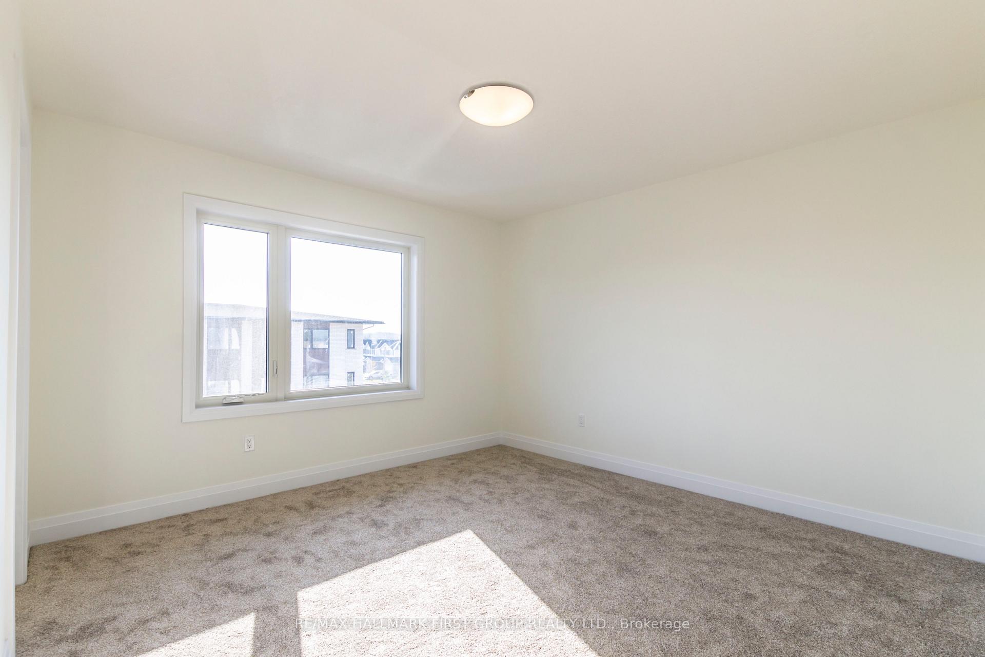 Photo 25 of 12 Lily Lane, Guelph, Clairfields/Hanlon Business Park — HOMEH
