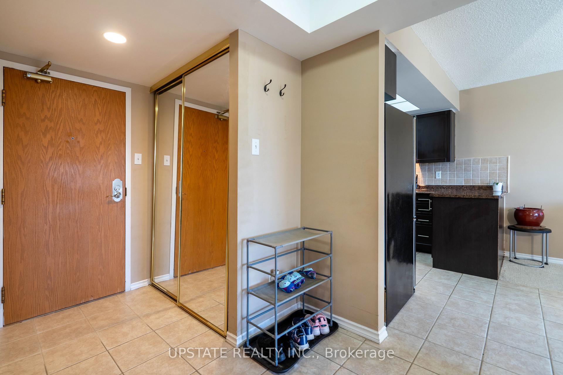 Photo 4 of Unit 306, 310 Mill Street S, Brampton, Brampton South — HOMEH
