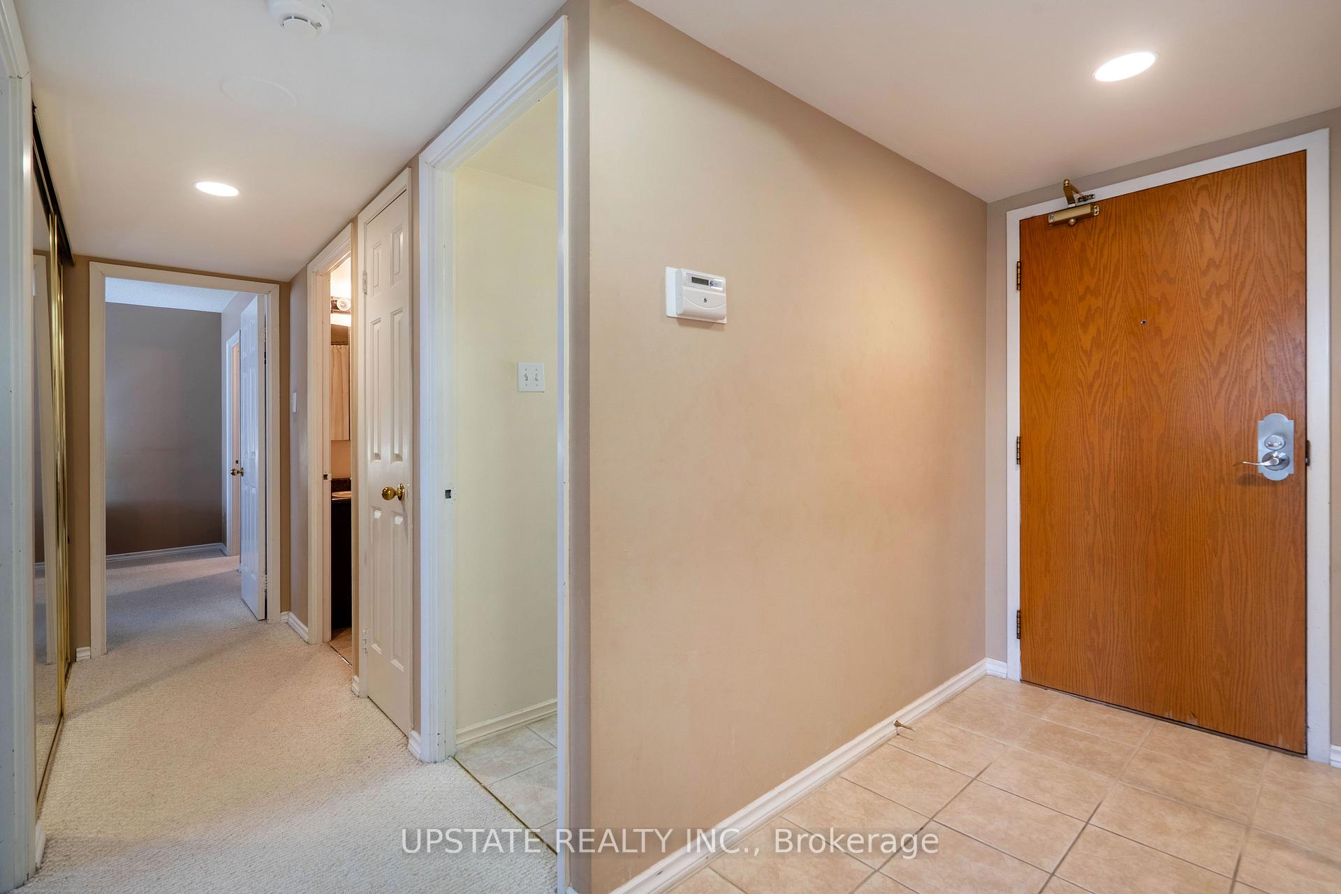 Photo 5 of Unit 306, 310 Mill Street S, Brampton, Brampton South — HOMEH